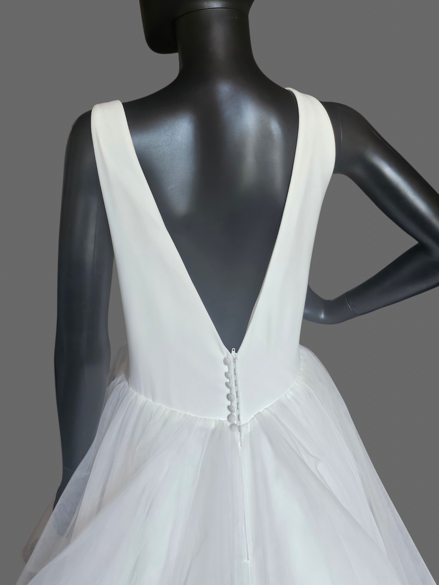 White Minimalist Plunge V-Neck Tiered Ballgown Wedding Dress - Maggie Sottero