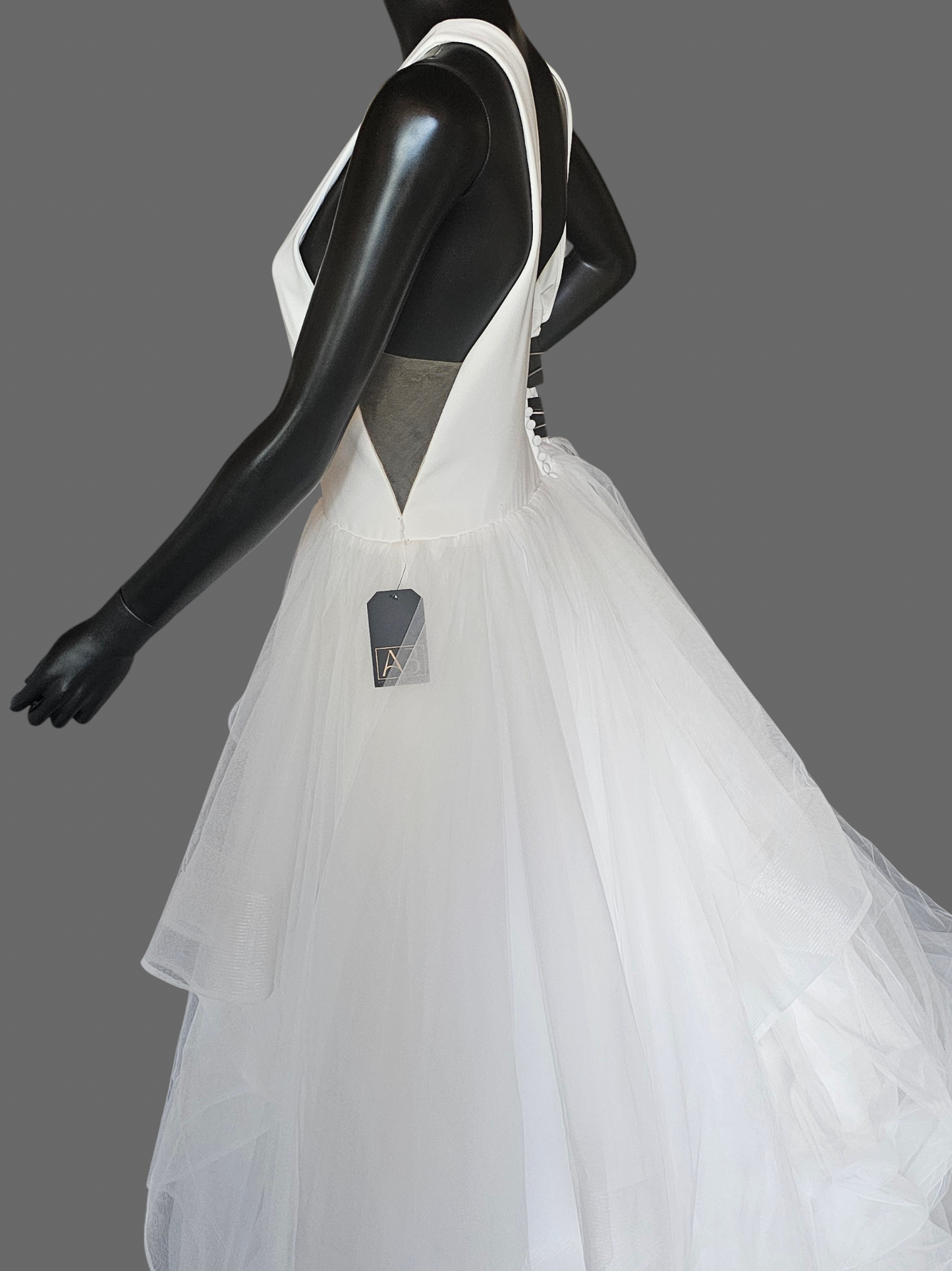 White Minimalist Plunge V-Neck Tiered Ballgown Wedding Dress - Maggie Sottero