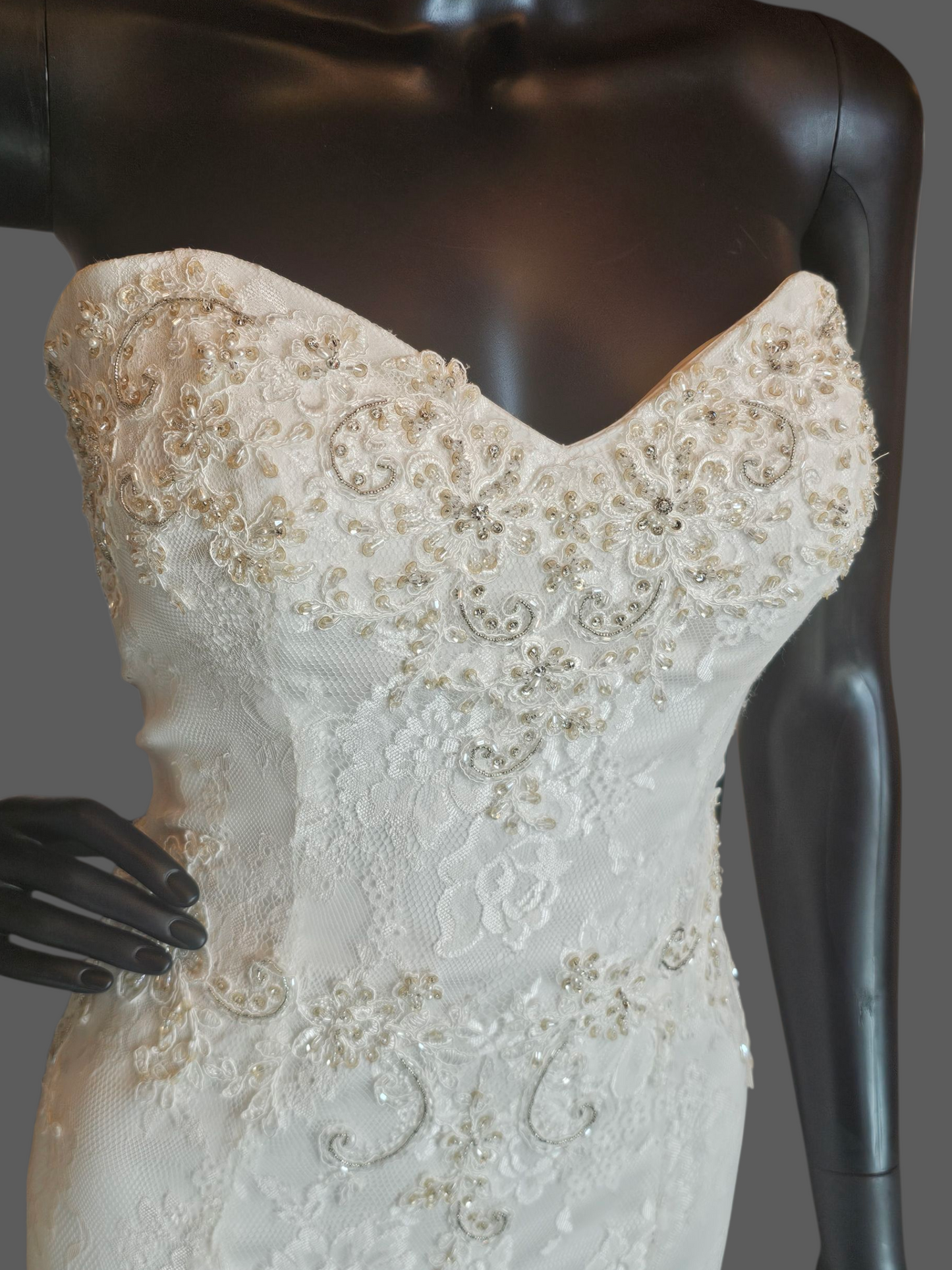 Ivory Lace Strapless Sweetheart Fit/Flare Verticle Ruffle Wedding Gown - Casablanca